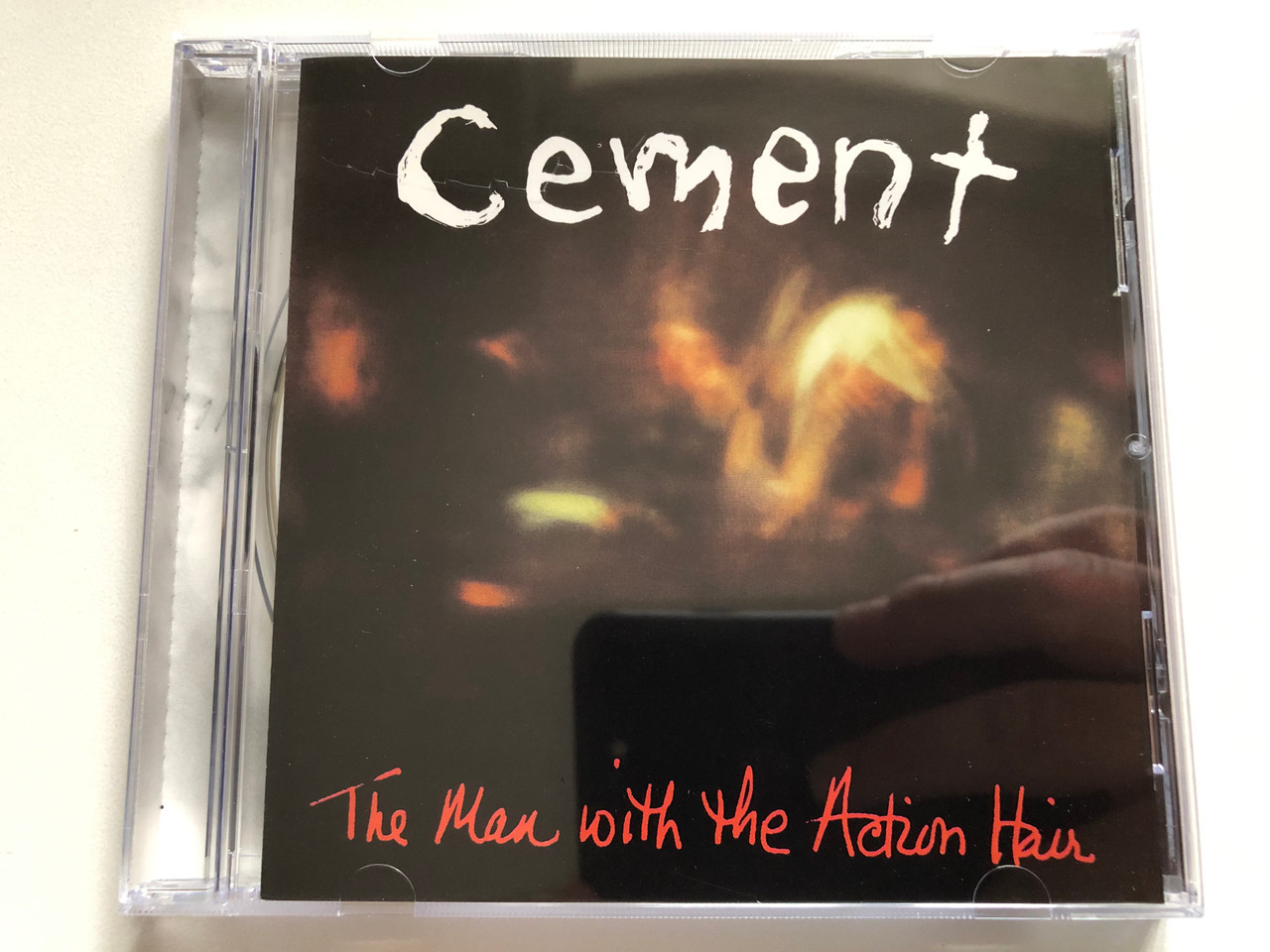 https://cdn11.bigcommerce.com/s-62bdpkt7pb/products/0/images/336374/Cement_The_Man_With_The_Action_Hair_World_Service_Audio_CD_1994_RTD_157.1745_1__37631.1718032203.1280.1280.JPG?c=2
