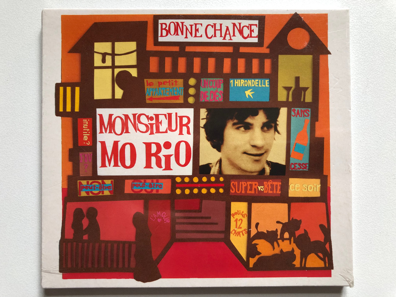 https://cdn11.bigcommerce.com/s-62bdpkt7pb/products/0/images/336562/Monsieur_Mo_Rio_Bonne_Chance_S.H.A.D.O._Records_Audio_CD_SUB022_1__47667.1718171418.1280.1280.JPG?c=2