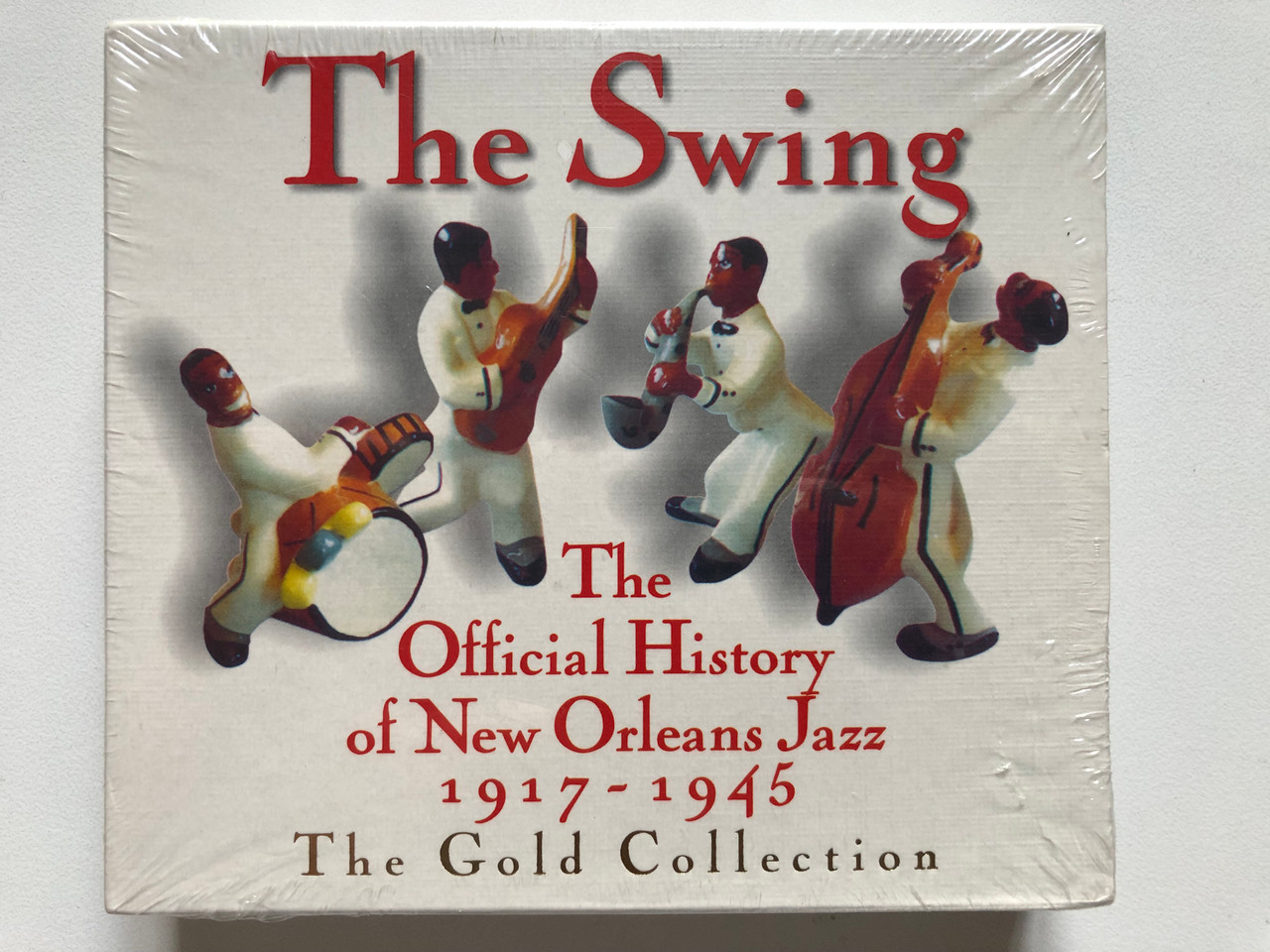 https://cdn11.bigcommerce.com/s-62bdpkt7pb/products/0/images/336673/The_Swing_The_Official_History_Of_New_Orleans_Jazz_1917-1945_The_Gold_Collection_Retro_2x_Audio_CD_R2CD_40-88_1__43188.1718258325.1280.1280.JPG?c=2