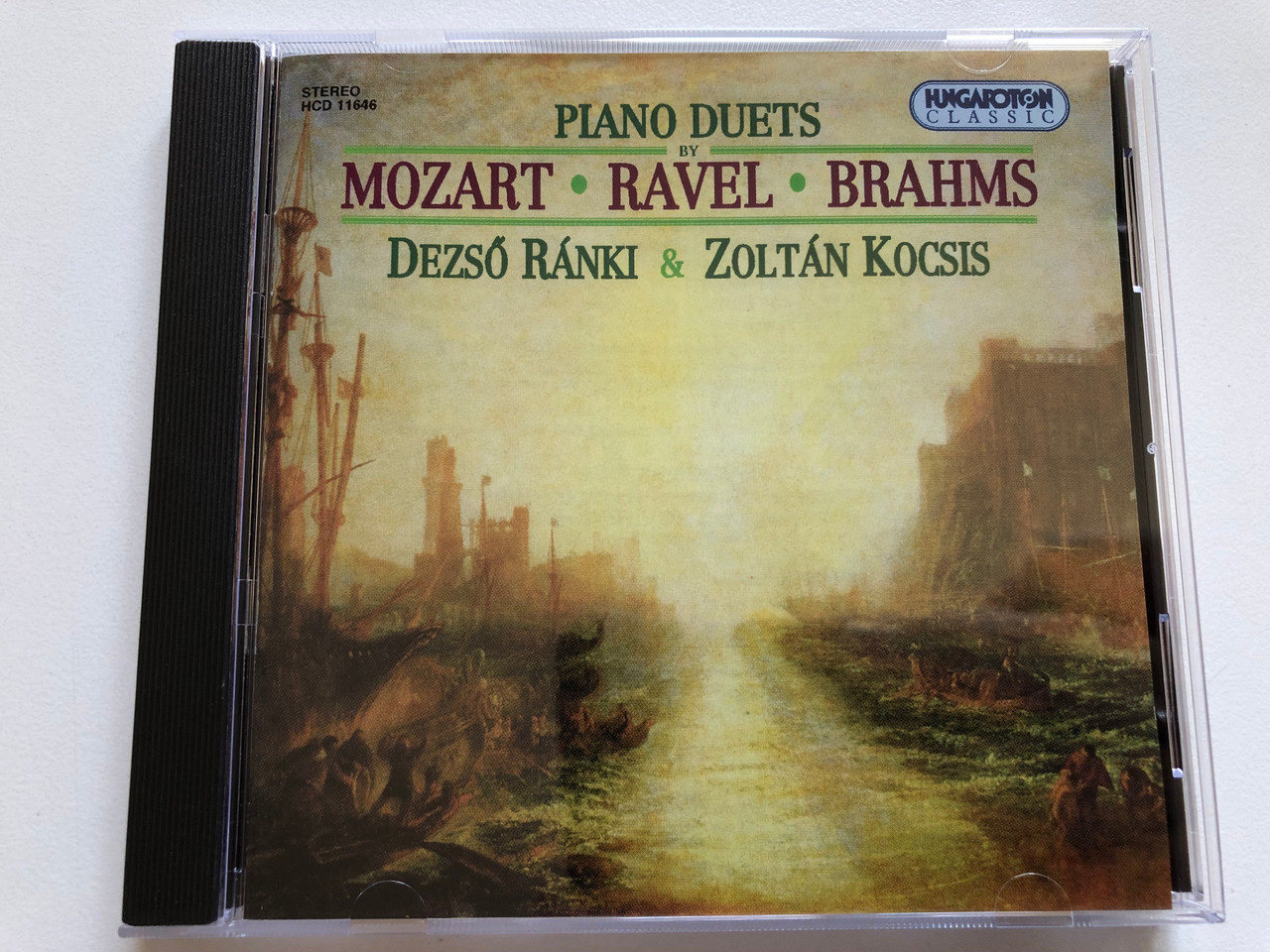 https://cdn11.bigcommerce.com/s-62bdpkt7pb/products/0/images/338416/Piano_Duets_By_Mozart_Ravel_Brahms_-_Dezs_Rnki_Zoltn_Kocsis_Hungaroton_Audio_CD_1994_Stereo_HCD_11646_1__41093.1719472980.1280.1280.JPG?c=2