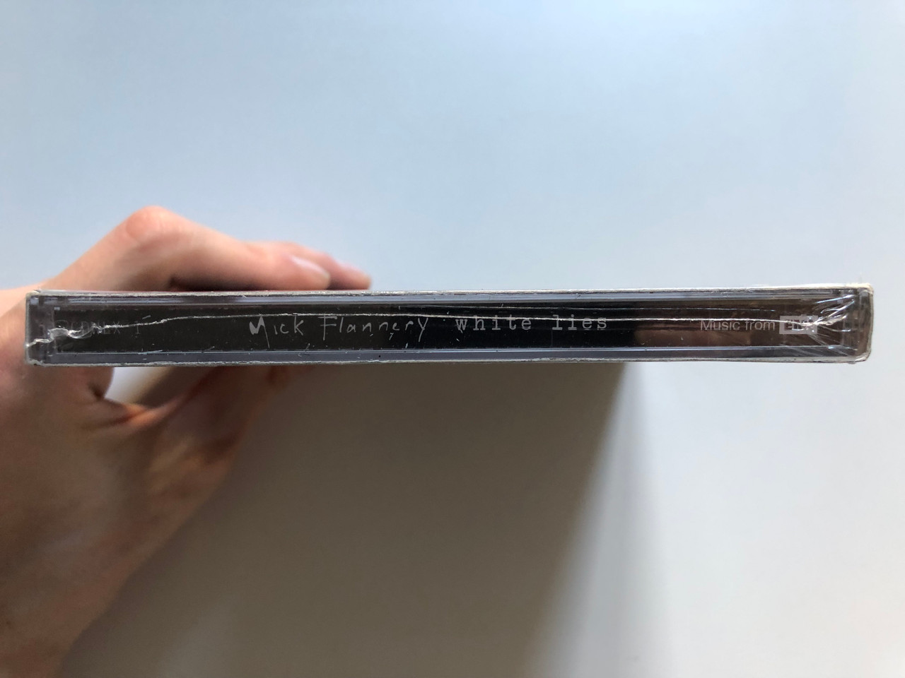 https://cdn11.bigcommerce.com/s-62bdpkt7pb/products/0/images/338568/Mick_Flannery_White_Lies_Deluxe_Limited_Edition-2cd._Includes_the_new_single_christmas_past_and_bonus_cd_recorded_live_at_the_cork_opera_house._EMI_Music_Ireland_2x_Audio_CD_2009_CDWLX_3__51905.1719494761.1280.1280.JPG?c=2