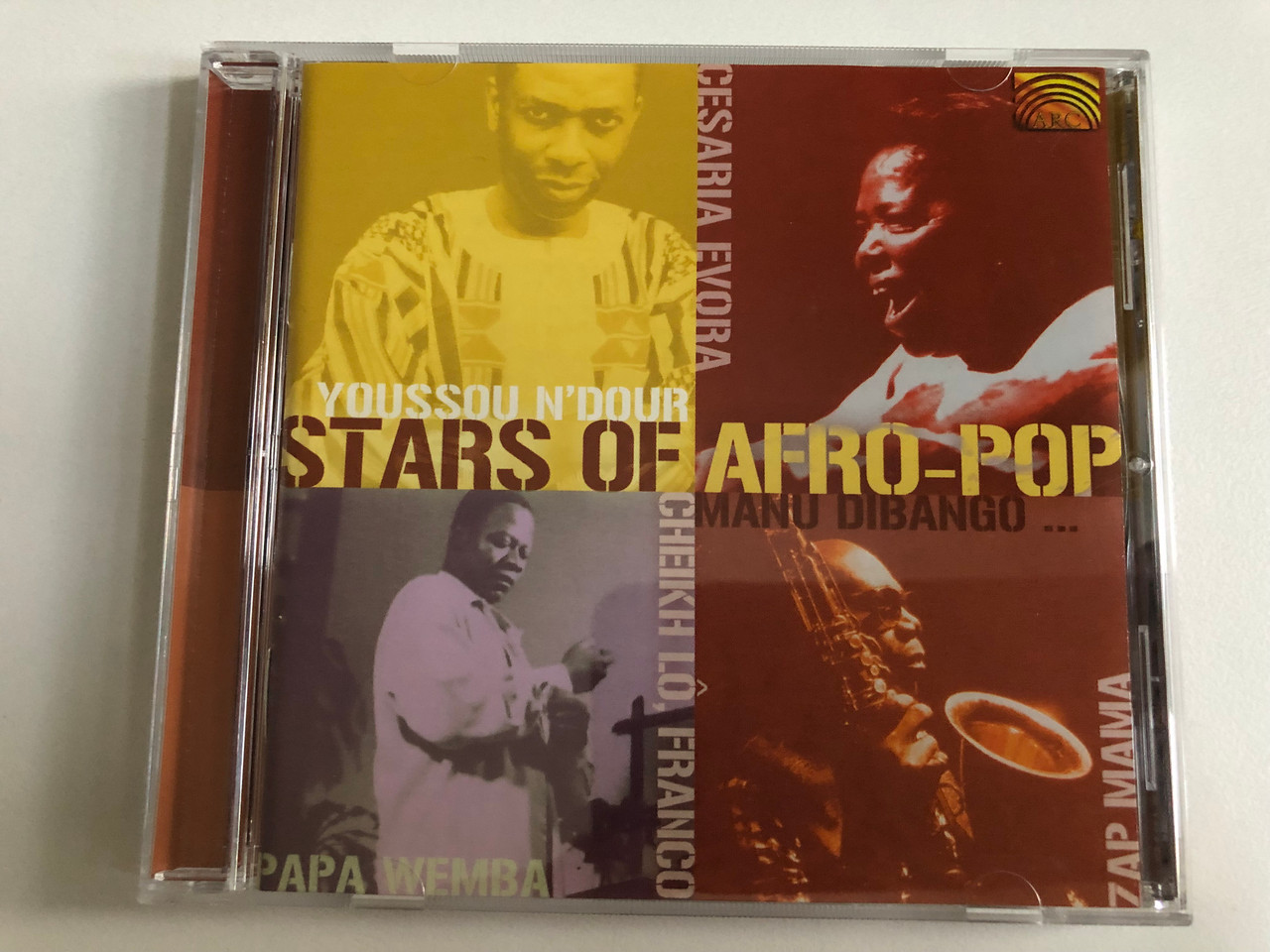 https://cdn11.bigcommerce.com/s-62bdpkt7pb/products/0/images/343267/Stars_Of_Afro-Pop_-_Youssou_NDour_Cesaria_Evora_Papa_Wemba_Zap_Mama_ARC_Music_Audio_CD_2001_EUCD_1680_1__56744.1722851284.1280.1280.JPG?c=2