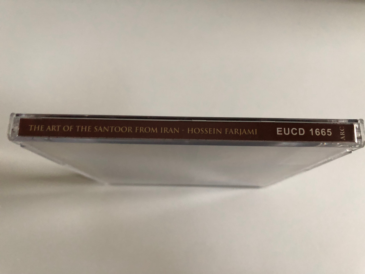 https://cdn11.bigcommerce.com/s-62bdpkt7pb/products/0/images/343310/The_Art_Of_Santoor_From_Iran_-_Hossein_Farjami_ARC_Music_Audio_CD_2001_EUCD_1665_3__17829.1722931229.1280.1280.JPG?c=2