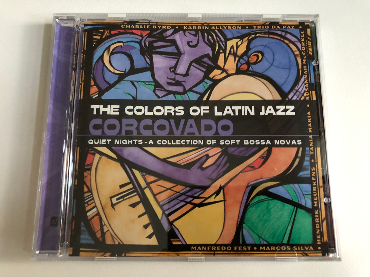 https://cdn11.bigcommerce.com/s-62bdpkt7pb/products/0/images/343392/The_Colors_Of_Latin_Jazz_Corcovado_-_Quiet_Nights_-_A_Collection_Of_Soft_Bossa_Novas_Charlie_Byrd_Karrin_Allyson_Trio_Da_Paz_Susannah_McCorkle_Tania_Maria_Hendrik_Meurkens_Marcos_Silva_1__18408.1723011476.1280.1280.JPG?c=2