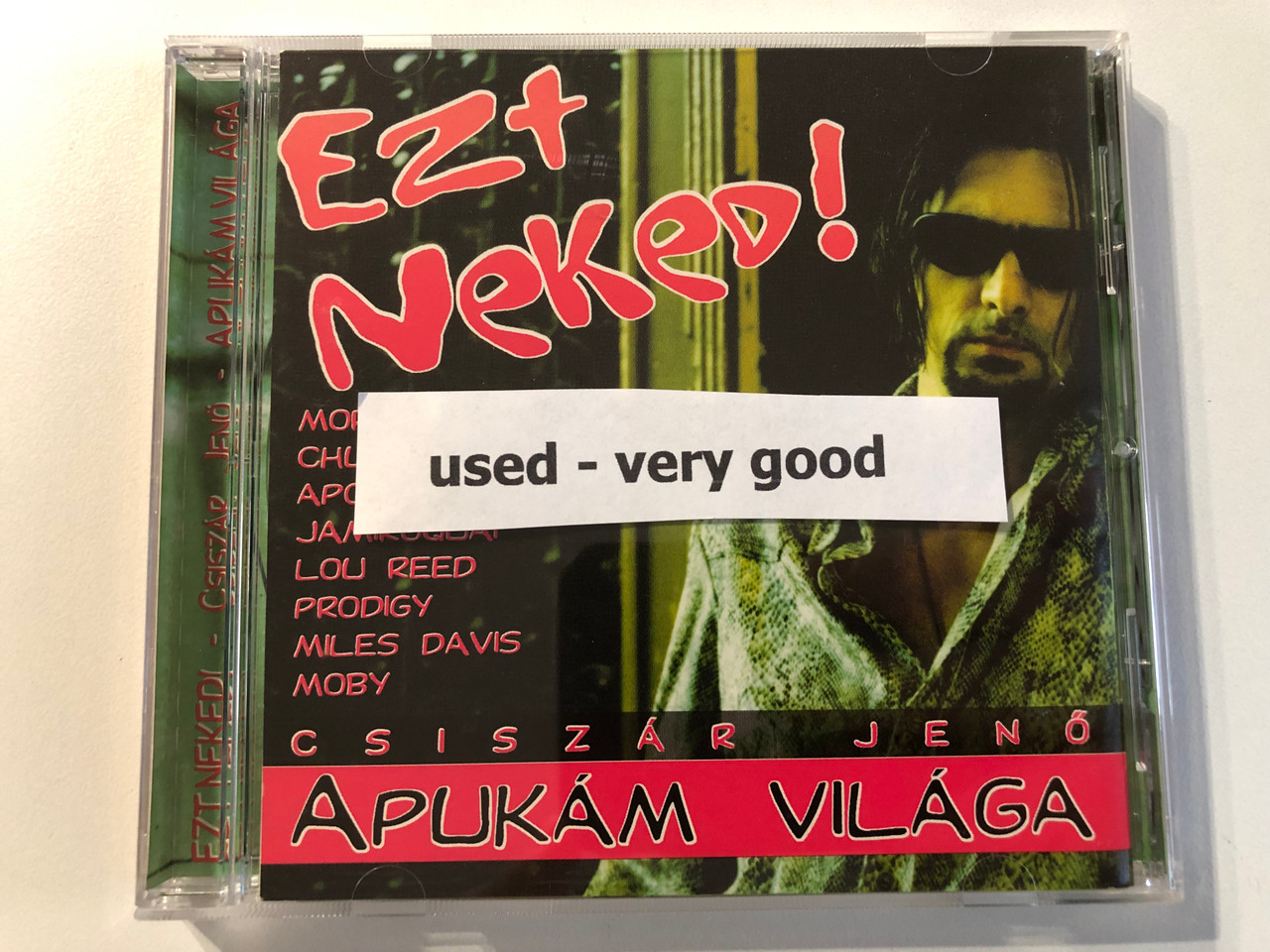 https://cdn11.bigcommerce.com/s-62bdpkt7pb/products/0/images/344079/Csiszr_Jen_Ezt_Neked_Apukm_Vilga_-_Morcheeba_Chumbawamba_Apollo_440_Jamiroquai_Lou_Reed_Prodigy_Miles_Davis_Moby_WEA_Audio_CD_1998_9548-37097-2_10__38681.1723194528.1280.1280.JPG?c=2