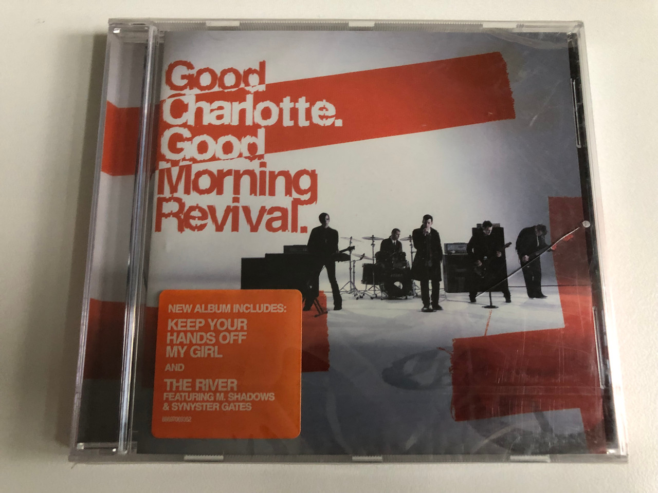 https://cdn11.bigcommerce.com/s-62bdpkt7pb/products/0/images/344383/Good_Charlotte_Good_Morning_Revival_New_Album_Includes_Keep_Your_Hands_Off_My_Girl_And_The_River_Featuring_M._Shadows_Synyster_Gates_Epic_Audio_CD_88697069352_1__01926.1723480532.1280.1280.JPG?c=2