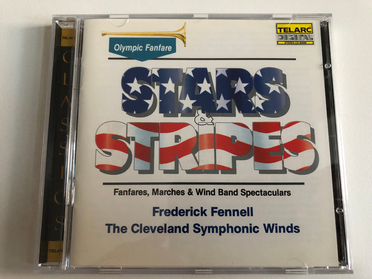 https://cdn11.bigcommerce.com/s-62bdpkt7pb/products/0/images/344560/Frederick_Fennell_The_Cleveland_Symphonic_Winds_-_Stars_Stripes_Fanfares_Marches_Wind_Band_Spectaculars_Telarc_Audio_CD_1984_CD-80099_1__76138.1723641846.1280.1280.JPG?c=2