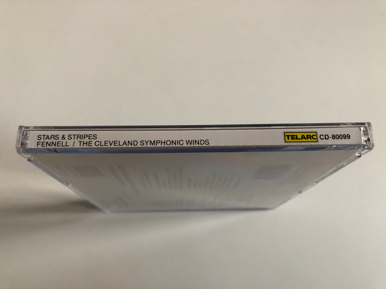 https://cdn11.bigcommerce.com/s-62bdpkt7pb/products/0/images/344562/Frederick_Fennell_The_Cleveland_Symphonic_Winds_-_Stars_Stripes_Fanfares_Marches_Wind_Band_Spectaculars_Telarc_Audio_CD_1984_CD-80099_3__68607.1723641863.1280.1280.JPG?c=2