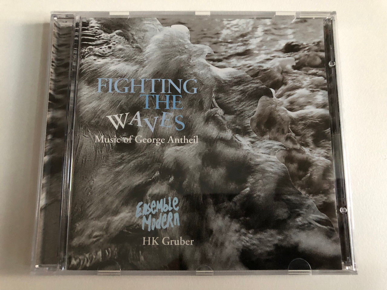 https://cdn11.bigcommerce.com/s-62bdpkt7pb/products/0/images/344572/Fighting_The_Waves_Music_Of_George_Antheil_-_Ensemble_Modern_HK_Gruber_RCA_Victor_Red_Seal_Audio_CD_1996_09026_68066_2_1__51505.1723646109.1280.1280.JPG?c=2