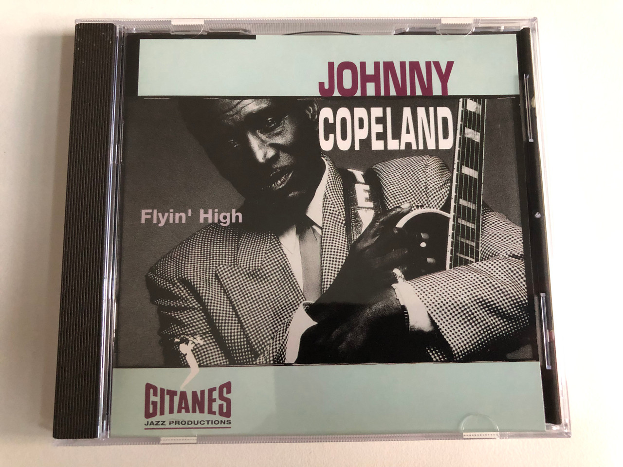 https://cdn11.bigcommerce.com/s-62bdpkt7pb/products/0/images/344760/Johnny_Copeland_Flyin_High_Gitanes_Jazz_Productions_Audio_CD_1992_517_512-2_1__91326.1723709665.1280.1280.JPG?c=2