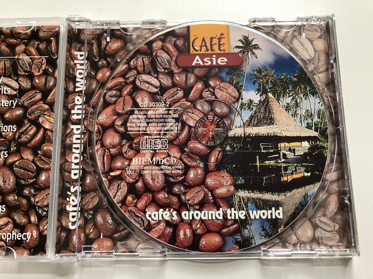 https://cdn11.bigcommerce.com/s-62bdpkt7pb/products/0/images/346014/Cafes_around_the_world_-_Cafe_Asie_Impresions_from_Asia_Cafes_around_the_world_Audio_CD_2002_CD_30309-2_3__14435.1724224494.1280.1280.JPG?c=2