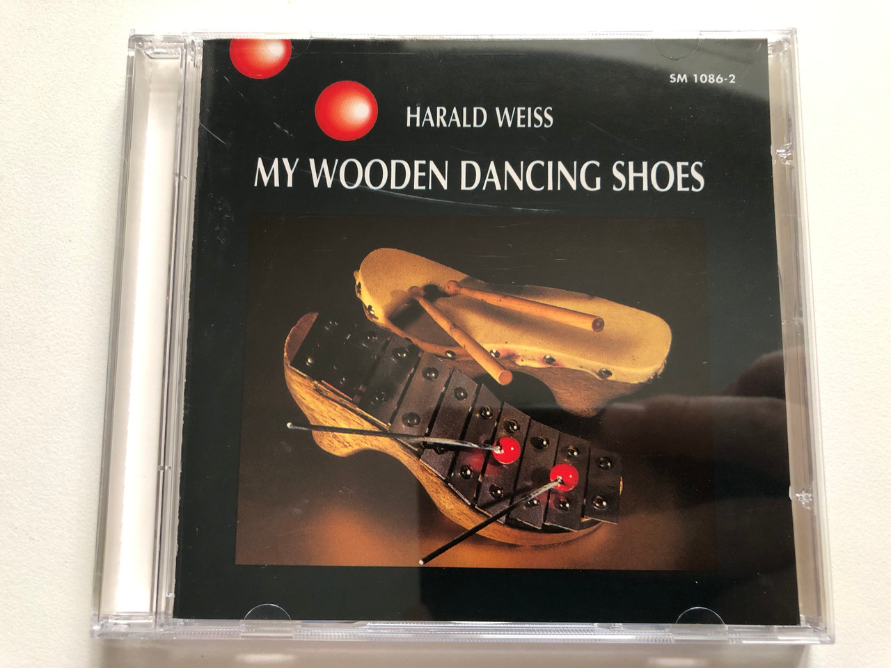 https://cdn11.bigcommerce.com/s-62bdpkt7pb/products/0/images/346070/Harald_Weiss_My_Wooden_Dancing_Shoes_WERGO_Schallplatten_GmbH_Audio_CD_1990_SM_1086-2_1__49348.1724231742.1280.1280.JPG?c=2