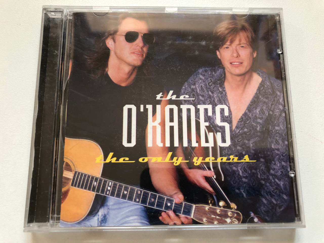 https://cdn11.bigcommerce.com/s-62bdpkt7pb/products/0/images/347054/The_OKanes_The_Only_Years_Lucky_Dog_Audio_CD_2000_501843_2_1__70417.1724827873.1280.1280.JPG?c=2