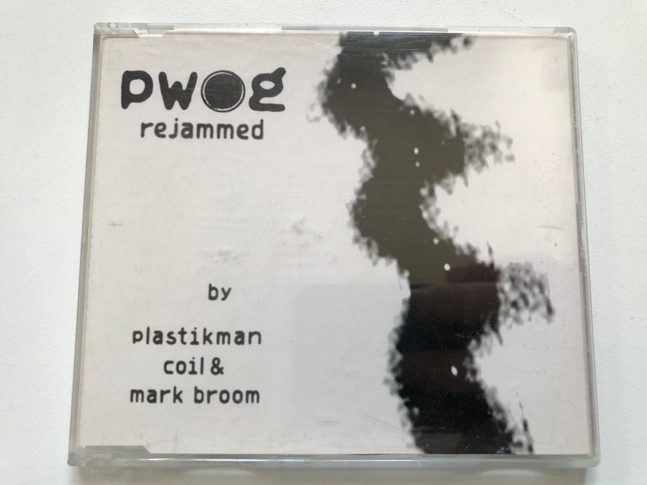 https://cdn11.bigcommerce.com/s-62bdpkt7pb/products/0/images/347090/PWOG_Rejammed_-_by_Plastikman_Coil_Mark_Broom_KK_Records_Audio_CD_1996_kk131_cds_1__95228.1724832899.1280.1280.JPG?c=2