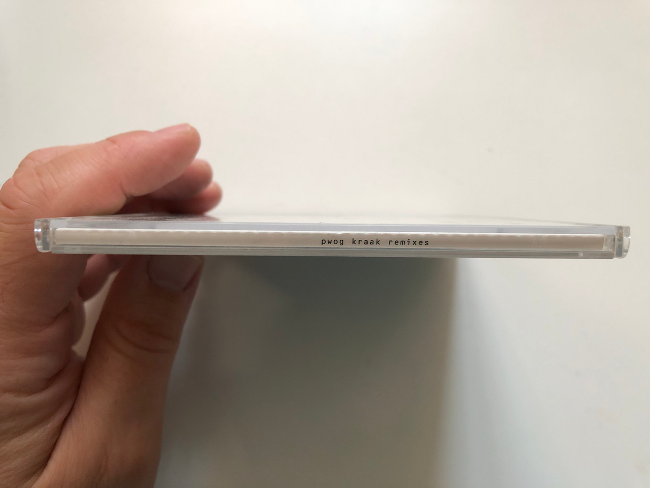 https://cdn11.bigcommerce.com/s-62bdpkt7pb/products/0/images/347092/PWOG_Rejammed_-_by_Plastikman_Coil_Mark_Broom_KK_Records_Audio_CD_1996_kk131_cds_3__69003.1724832914.1280.1280.JPG?c=2
