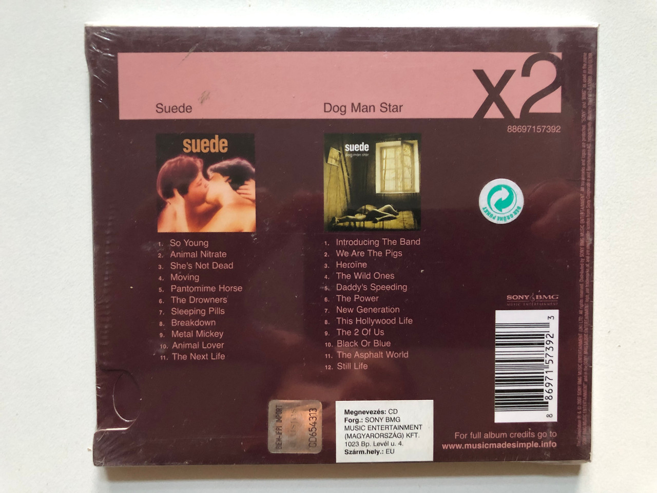 https://cdn11.bigcommerce.com/s-62bdpkt7pb/products/0/images/347185/Suede_-_Suede_Dog_Man_Star_Sony_BMG_Music_2x_Audio_CD_2007_88697157392_2__85401.1724946762.1280.1280.JPG?c=2