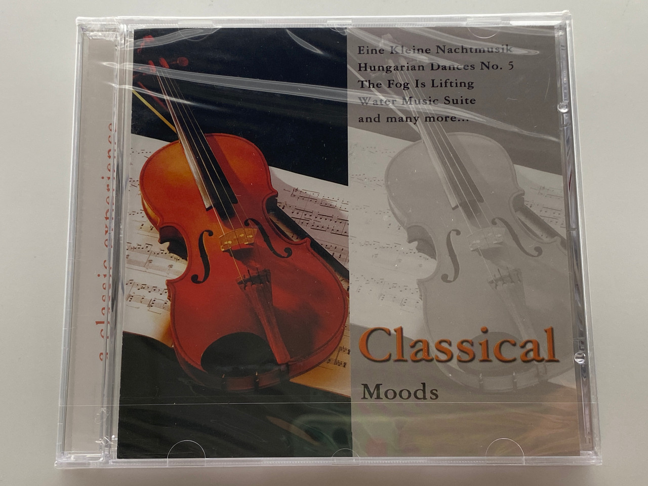 https://cdn11.bigcommerce.com/s-62bdpkt7pb/products/0/images/349990/Classical_Moods_-_Eine_Kleine_Nachtmusik_Hungarian_Dances_No._5_The_Fog_Is_Lifting_Water_Music_Suite_and_many_more..._Elap_Audio_CD_2005_1__97643.1727719965.1280.1280.jpg?c=2