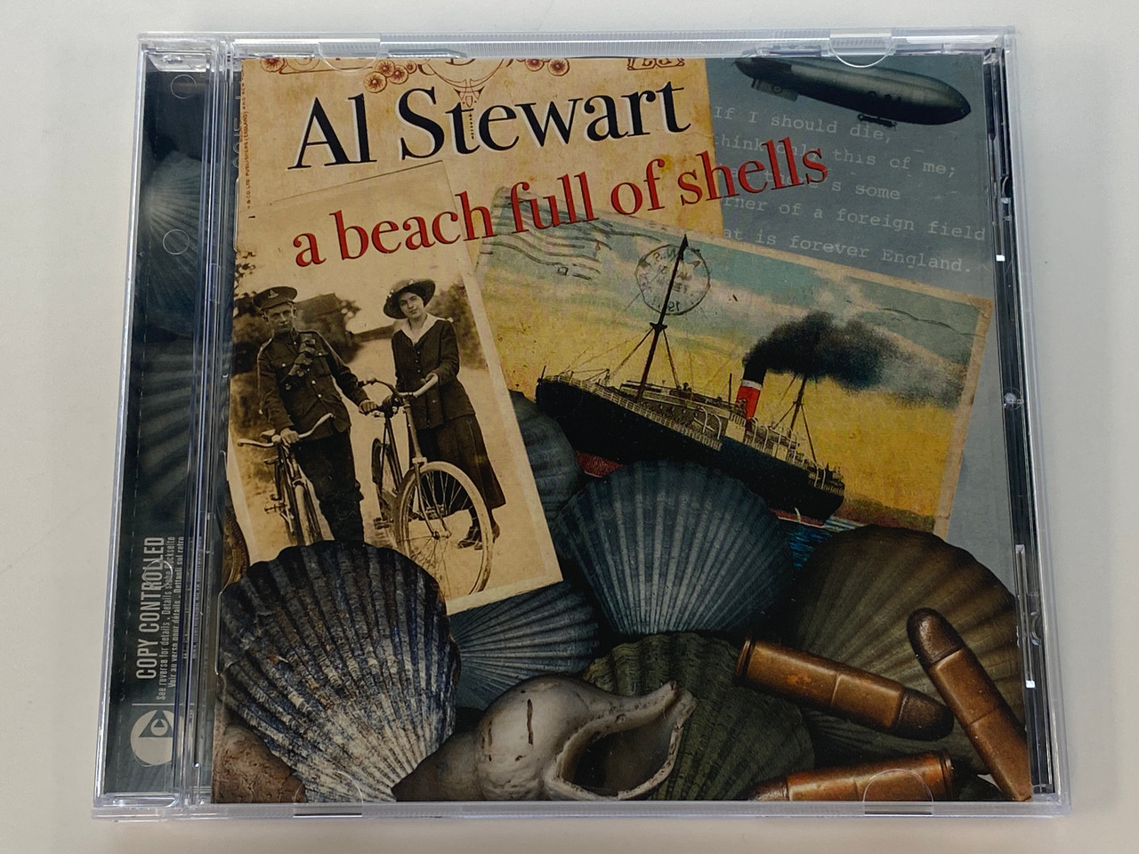 https://cdn11.bigcommerce.com/s-62bdpkt7pb/products/0/images/350963/Al_Stewart_A_Beach_Full_Of_Shells_EMI_Audio_CD_2005_094631182129_1__84572.1727878625.1280.1280.jpg?c=2