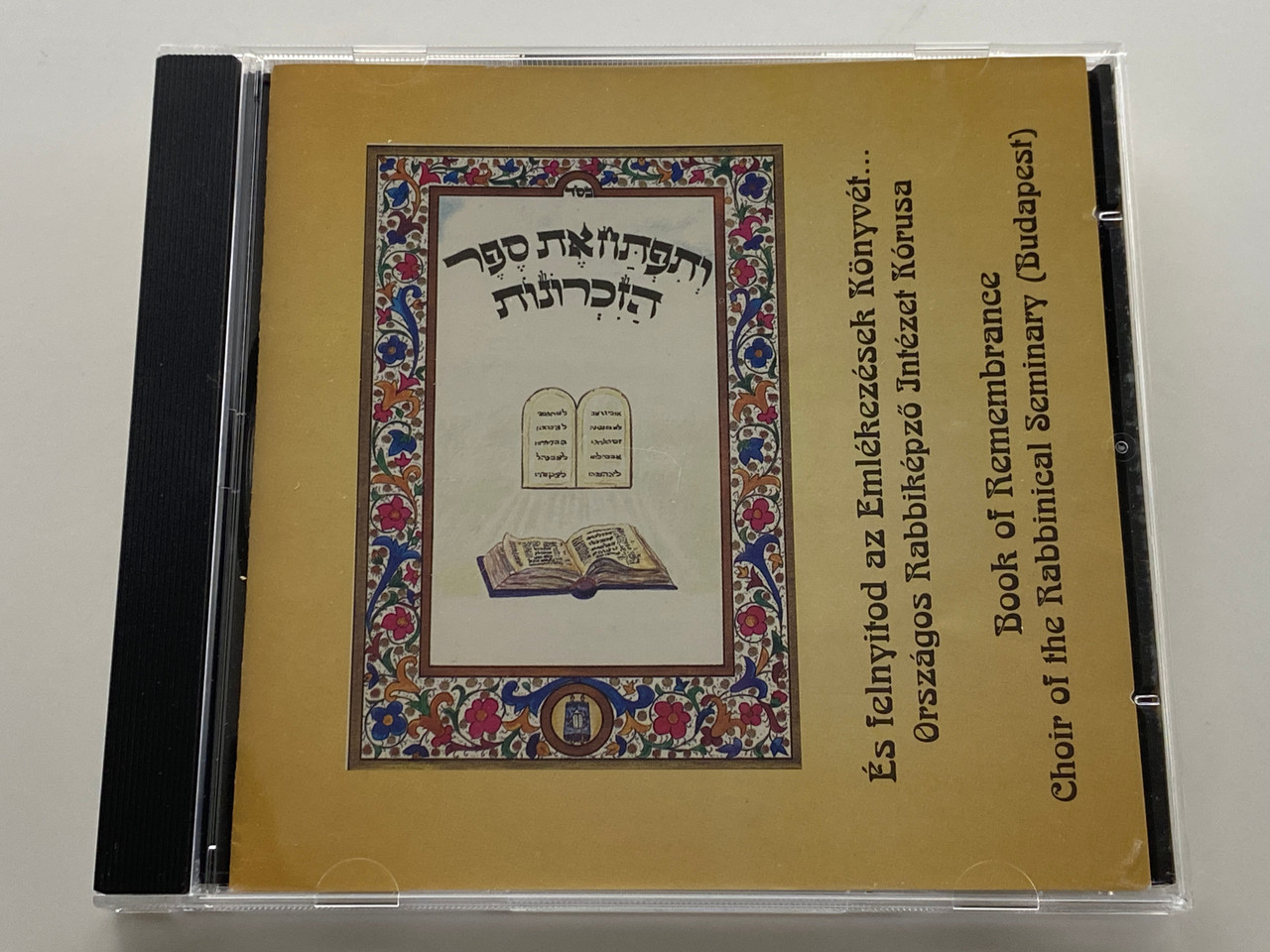 https://cdn11.bigcommerce.com/s-62bdpkt7pb/products/0/images/351315/Book_Of_Remembrance_-_Choir_of_the_Rabbinical_Seminary_Budapest_Aegon_Audio_CD_PRECD_9811_1__14452.1727951426.1280.1280.jpg?c=2