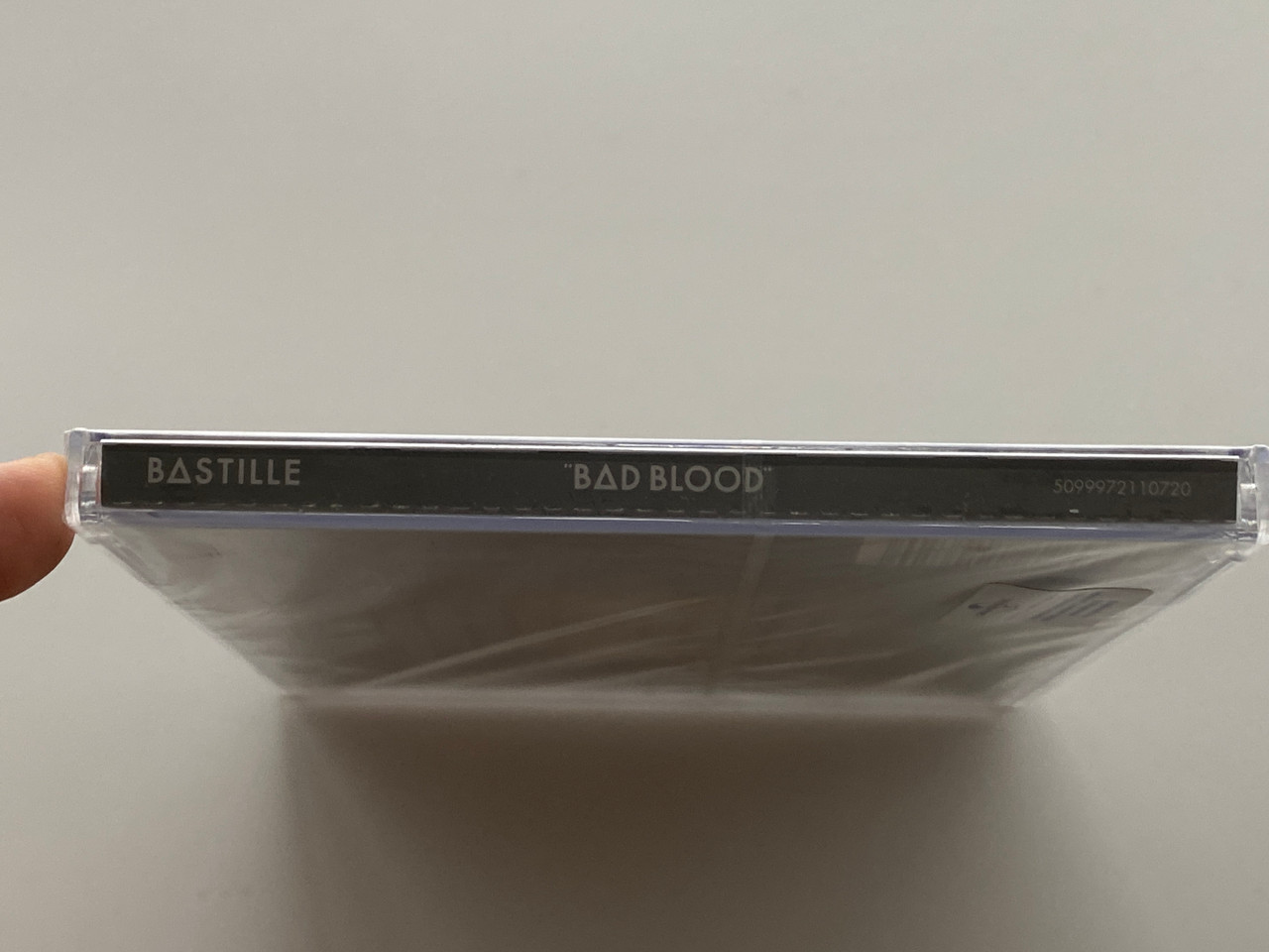 https://cdn11.bigcommerce.com/s-62bdpkt7pb/products/0/images/351451/Bastille_Bad_Blood_The_Debut_Album_Includes_The_Singles_Pompeii_Flaws_Laura_Palmer_Virgin_Audio_CD_2013_5099972110720_3__26930.1727971916.1280.1280.jpg?c=2
