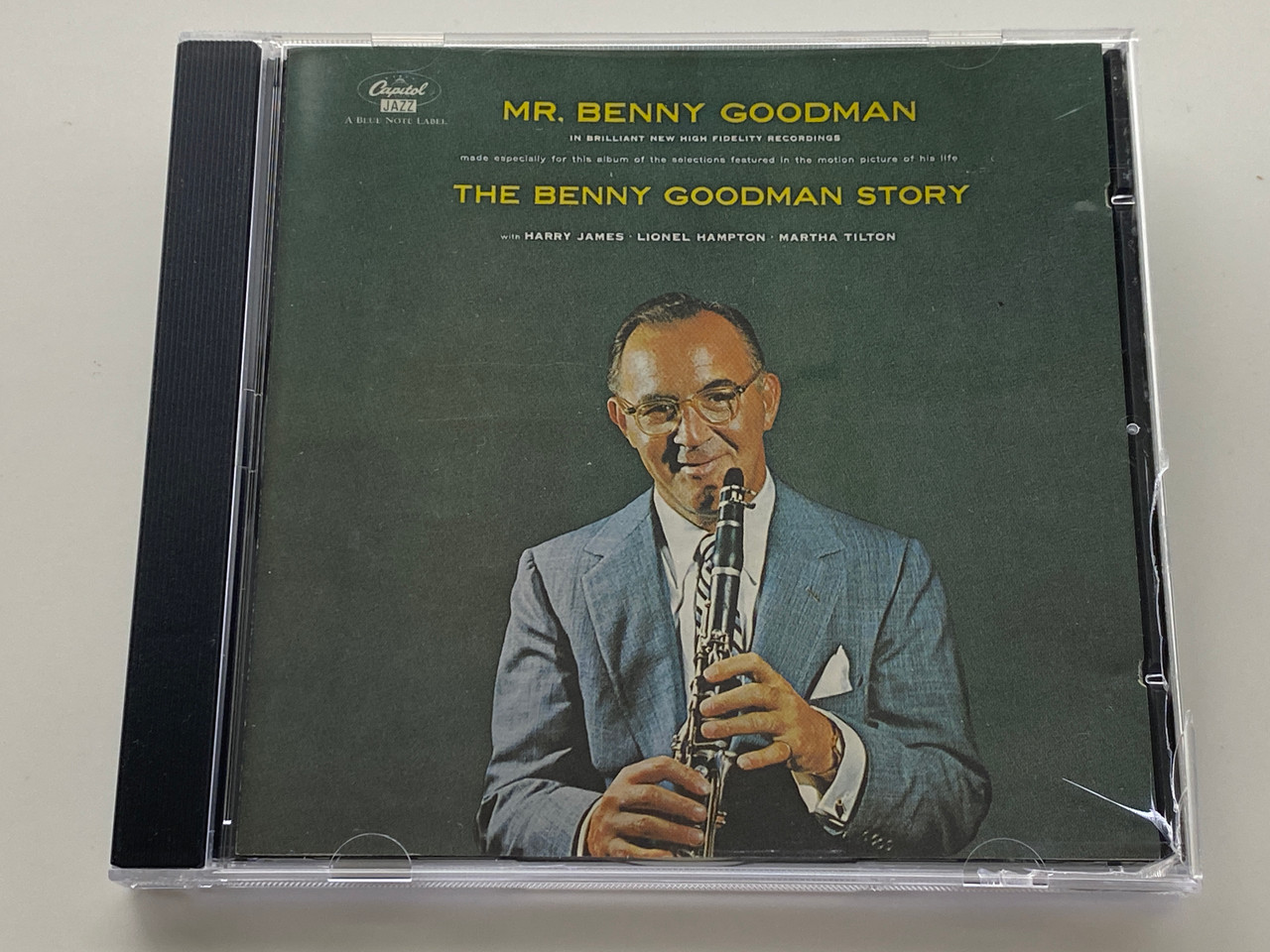 https://cdn11.bigcommerce.com/s-62bdpkt7pb/products/0/images/351455/Mr._Benny_Goodman_The_Benny_Goodman_Story_with_Harry_James_Lionel_Hampton_Martha_Tilton_Capitol_Jazz_Audio_CD_1995_CDP_7243_8_33569_2_8_1__39057.1727972797.1280.1280.jpg?c=2
