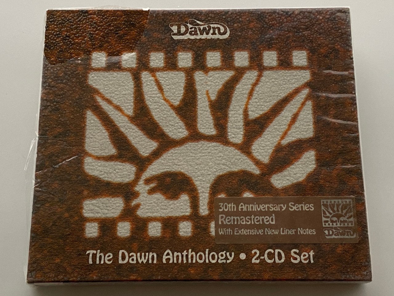 https://cdn11.bigcommerce.com/s-62bdpkt7pb/products/0/images/352065/The_Dawn_Anthology_30th_Anniversary_Series_Remastered_With_Extensive_New_Liner_Notes_Dawn_2x_Audio_CD_1999_ESACD_774_1__38448.1728044108.1280.1280.jpg?c=2