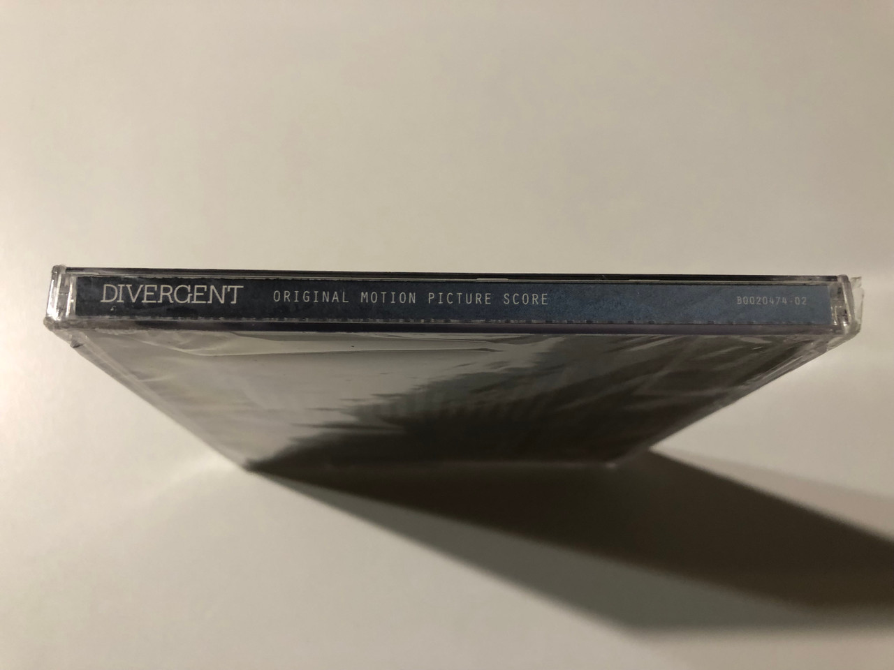 https://cdn11.bigcommerce.com/s-62bdpkt7pb/products/0/images/353687/Divergent_Original_Motion_Picture_Score_-_Original_Score_Composed_By_Junkie_XL_Interscope_Records_Audio_CD_2014_B0020474-02_3__29730.1728551201.1280.1280.JPG?c=2