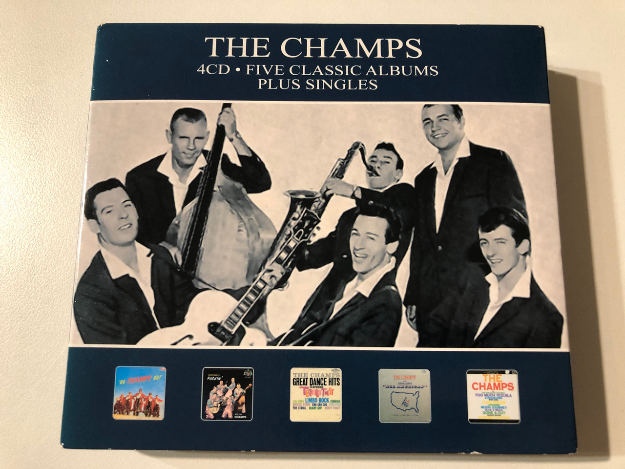 https://cdn11.bigcommerce.com/s-62bdpkt7pb/products/0/images/353697/The_Champs_Five_Classic_Albums_Plus_Singles_Reel_To_Reel_Music_Company_4x_Audio_CD_Box_Set_RTRCD75_1__20563.1728552541.1280.1280.JPG?c=2