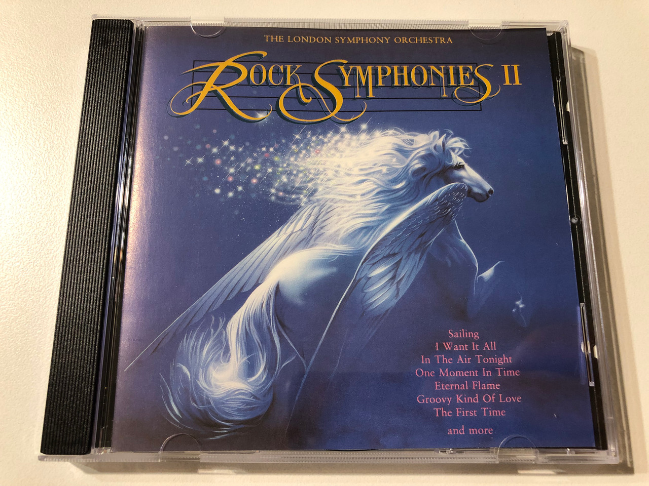 https://cdn11.bigcommerce.com/s-62bdpkt7pb/products/0/images/353725/The_London_Symphony_Orchestra_Rock_Symphonies_Vol._II_-_Sailing_I_Want_It_All_In_The_Air_Tonight_One_Moment_In_Time_Eternal_Flame_Groovy_Kind_Of_Love_The_First_Time_and_more_Portrait_1__90602.1728557200.1280.1280.JPG?c=2