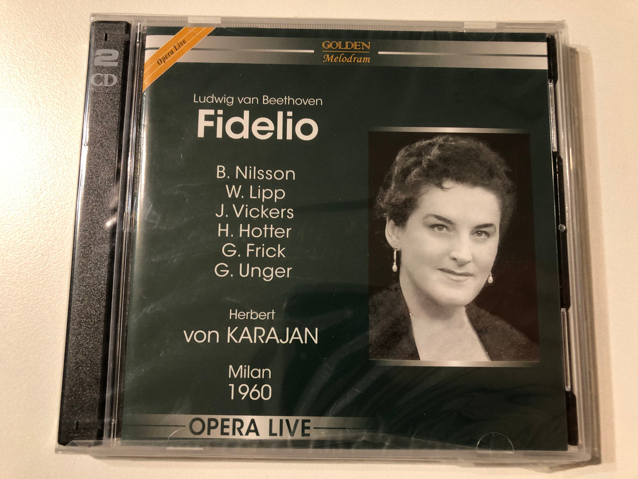 https://cdn11.bigcommerce.com/s-62bdpkt7pb/products/0/images/353754/Ludwig_van_Beethoven_Fidelio_-_B._Nilsson_W._Lipp_J._Vickers_H._Hotter_G._Frick_G._Unger_Herbert_von_Karajan_Milan_1960_Opera_Live_Golden_Melodram_2x_Audio_CD_Mono_2007_GM_5_1__83517.1728562841.1280.1280.JPG?c=2