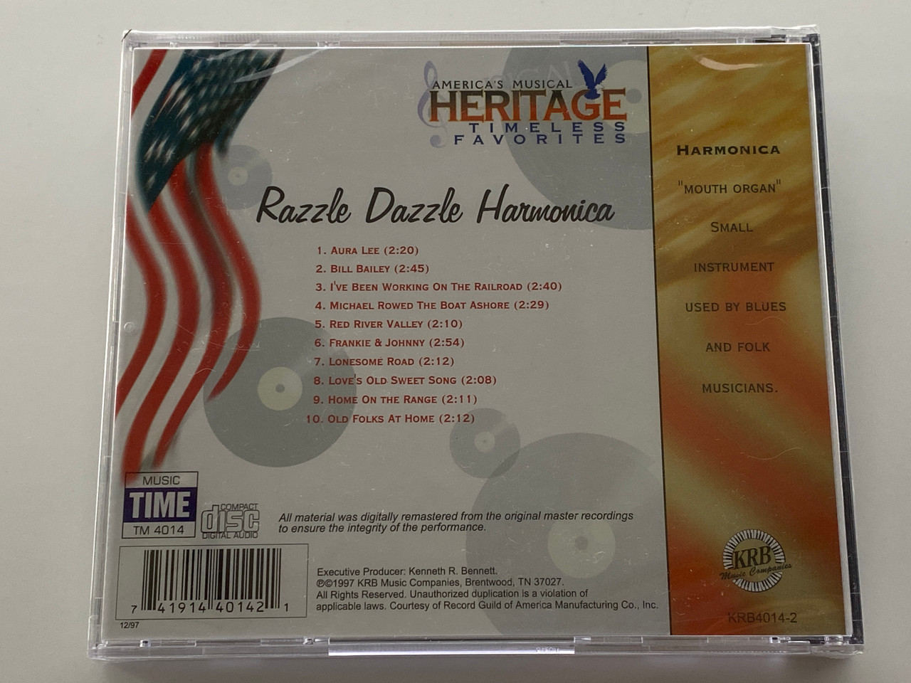 https://cdn11.bigcommerce.com/s-62bdpkt7pb/products/0/images/354201/American_Heritage_Razzle_Dazzle_Harmonica_-_featuring..._Dean_Jackson_Auara_Lee_Ive_Been_Working_On_The_Railroad_Red_River_Valley_Home_On_The_Range_and_others_KRB_Music_Companies_Au__91829.1728935402.1280.1280.jpg?c=2