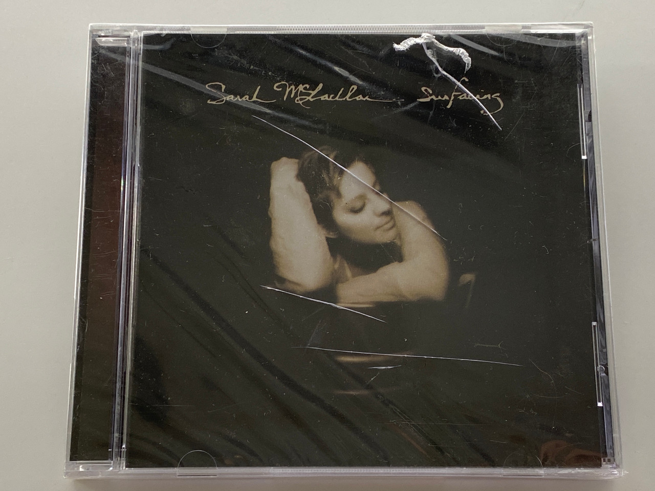 https://cdn11.bigcommerce.com/s-62bdpkt7pb/products/0/images/354316/Sarah_McLachlan_Surfacing_Arista_Audio_CD_1997_Stereo_ARCD_8970_1__82397.1728995645.1280.1280.jpg?c=2