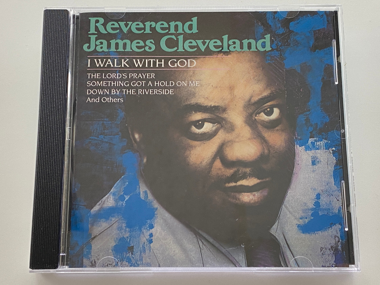 https://cdn11.bigcommerce.com/s-62bdpkt7pb/products/0/images/354370/Reverend_James_Cleveland_I_Walk_With_God_The_Lords_Prayer_Something_Got_A_Hold_On_Me_Down_By_The_Riverside_and_others_Sony_Music_Special_Products_Audio_CD_1991_A_18030_1__98065.1729021783.1280.1280.jpg?c=2