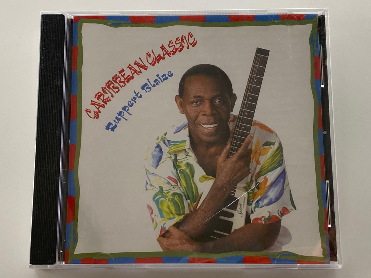 https://cdn11.bigcommerce.com/s-62bdpkt7pb/products/0/images/354396/Caribbean_Classic_-_Ruppert_Blaize_Audio_CD_2001_RB016_1__03808.1729076223.1280.1280.jpg?c=2