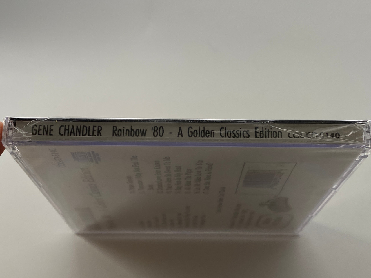 https://cdn11.bigcommerce.com/s-62bdpkt7pb/products/0/images/354429/Gene_Chandler_Rainbow_80_A_Golden_Classics_Edition_-_Featuring_Get_Down_When_Youre_1_Does_She_Have_A_Friend_Plus_Much_More_Collectables_Audio_CD_1994_COL-CD-5140_3__45793.1729095319.1280.1280.jpg?c=2