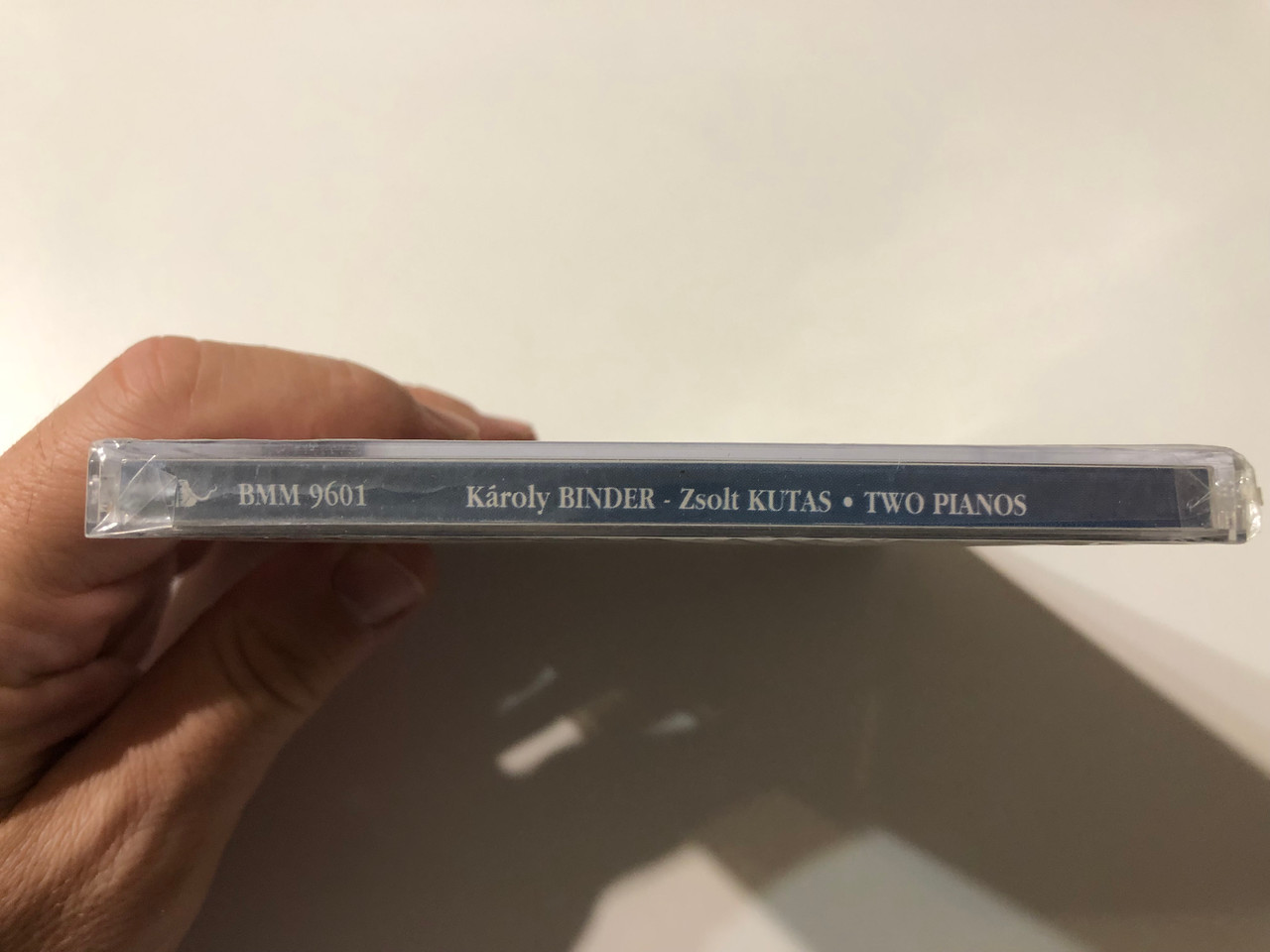 https://cdn11.bigcommerce.com/s-62bdpkt7pb/products/0/images/355058/Binder_Kroly_Kutas_Zsolt_Two_Pianos_Binder_Music_Manufactory_Audio_CD_BMM_9601_3__36950.1729241368.1280.1280.JPG?c=2