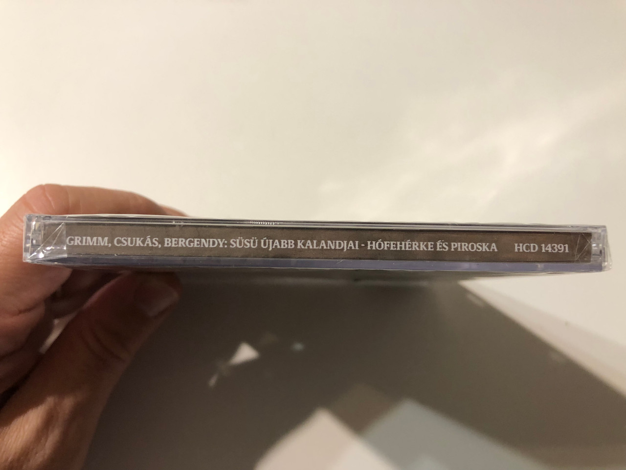 https://cdn11.bigcommerce.com/s-62bdpkt7pb/products/0/images/355557/Grimm_Csukas_Bergendy_2_Susu_Ujabb_Kalandjai_Hofeherke_Es_Piroska_-_Bodrogi_Gyulaval_Hungaroton_Audio_CD_HCD_14391_3__76890.1729358969.1280.1280.JPG?c=2
