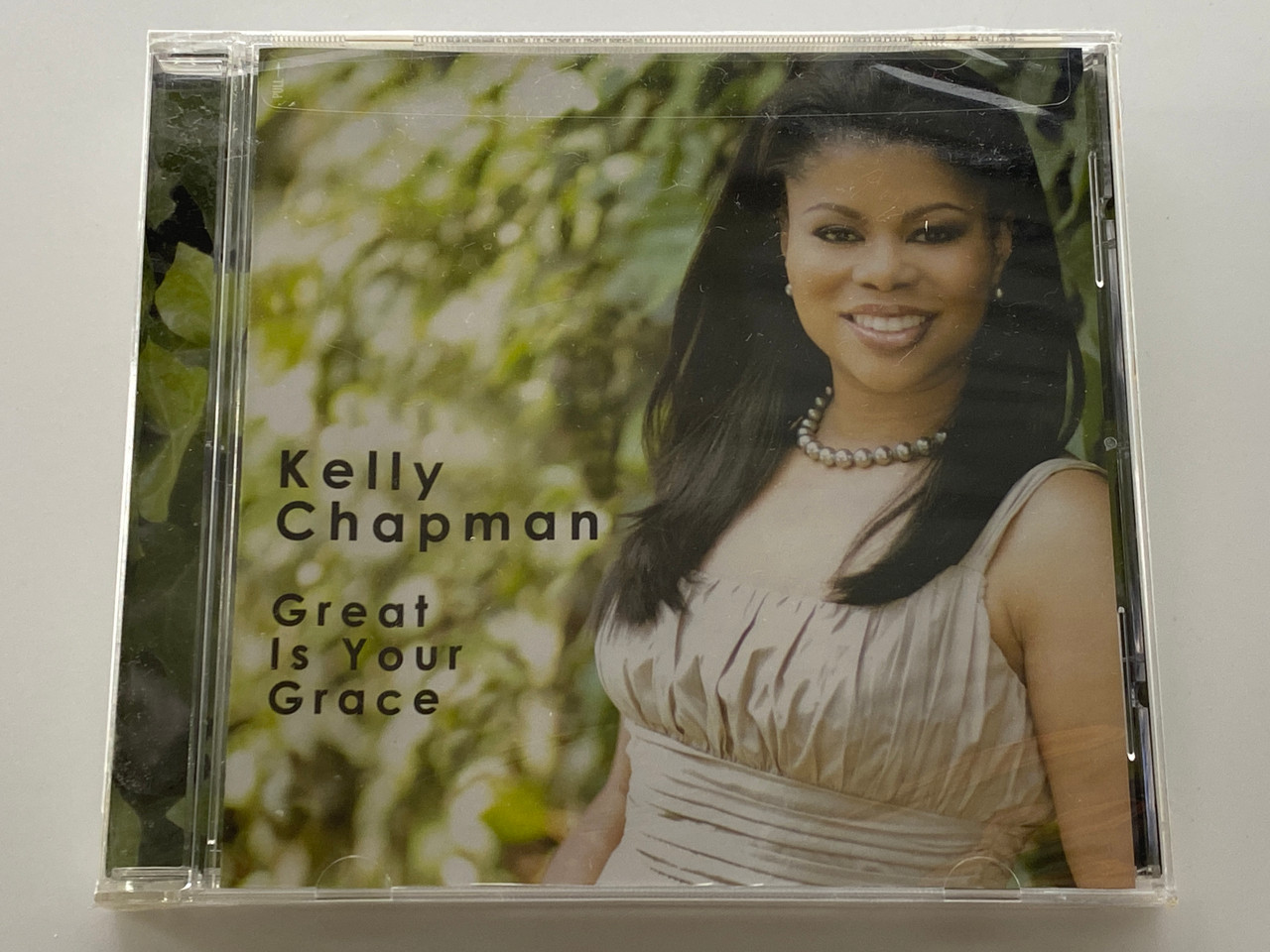 https://cdn11.bigcommerce.com/s-62bdpkt7pb/products/0/images/355917/Kelly_Chapman_-_Great_Is_Your_Grace_Lightworld_Records_Audio_CD_2009_1__19621.1729526211.1280.1280.jpg?c=2