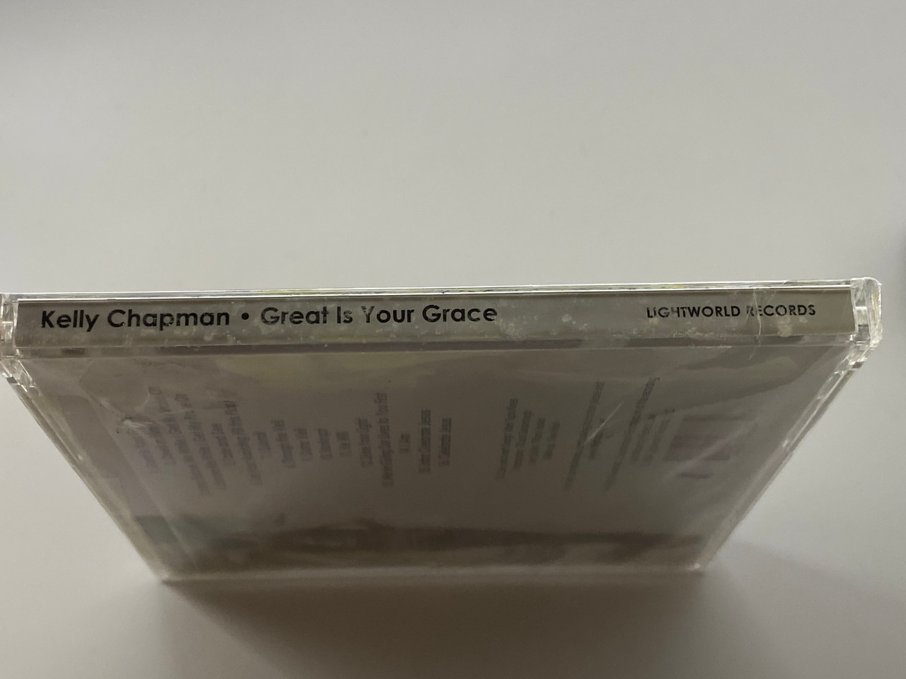 https://cdn11.bigcommerce.com/s-62bdpkt7pb/products/0/images/355919/Kelly_Chapman_-_Great_Is_Your_Grace_Lightworld_Records_Audio_CD_2009_3__53094.1729526214.1280.1280.jpg?c=2