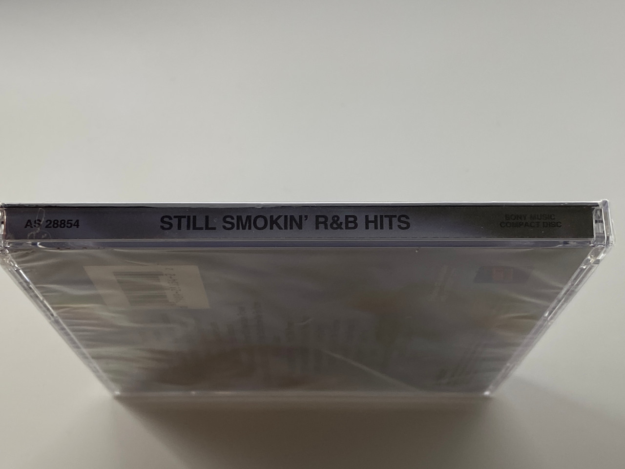 https://cdn11.bigcommerce.com/s-62bdpkt7pb/products/0/images/355922/Still_Smokin_RB_Hits_-_Featuring_Luther_Vandross_Earth_Wind_Fire_The_OJays_The_Isley_Brother_Labelle_The_Manhattans_And_Many_More_Sony_Music_Audio_CD_1997_AS_28854_3__62262.1729526872.1280.1280.jpg?c=2
