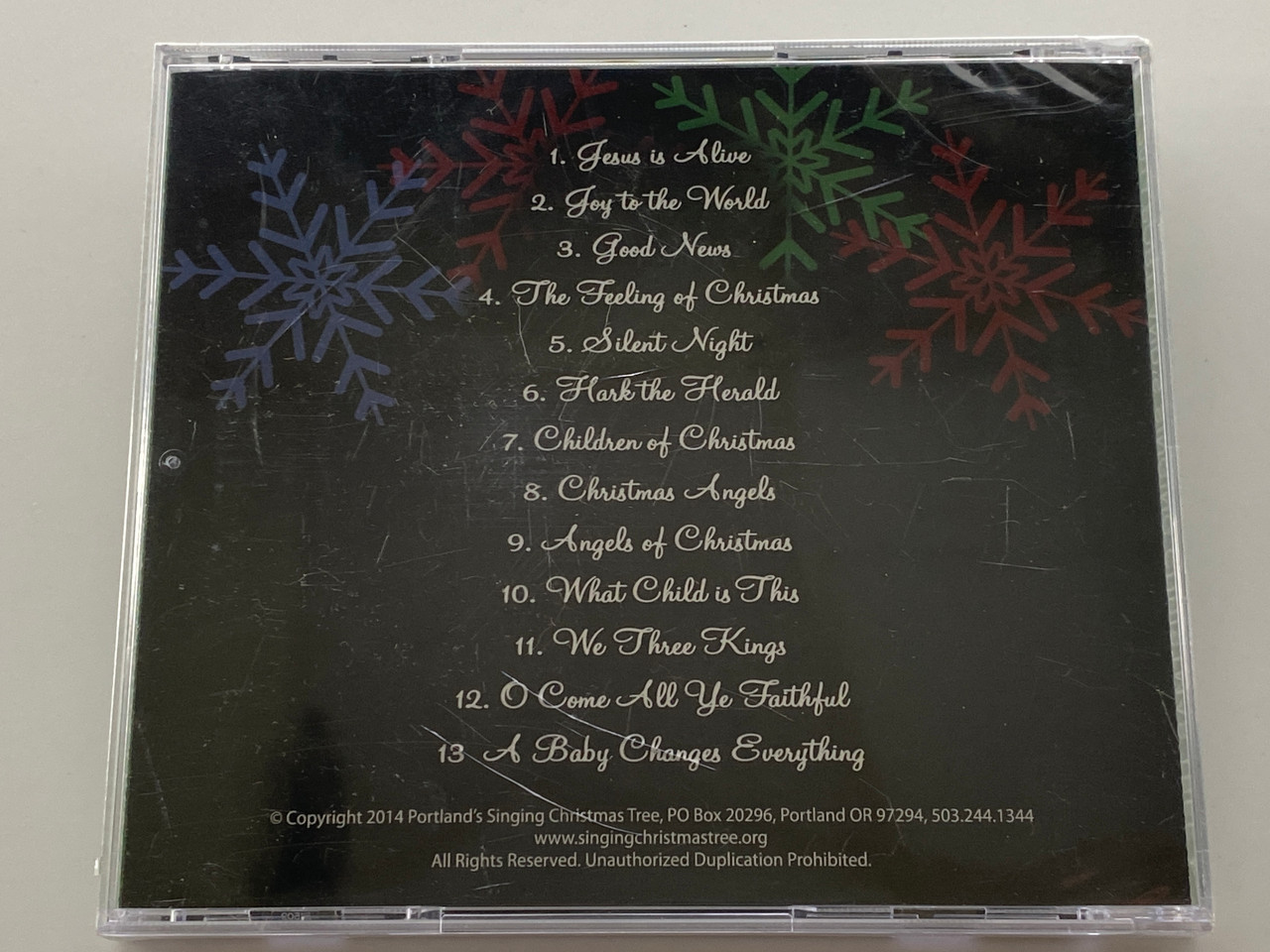 https://cdn11.bigcommerce.com/s-62bdpkt7pb/products/0/images/355924/Portlands_Singing_Christmas_Tree_-_Celebrating_52_years_in_Portland_Directed_by_Wes_Walterman_December_2014_Audio_CD_2014_2__27236.1729527398.1280.1280.jpg?c=2