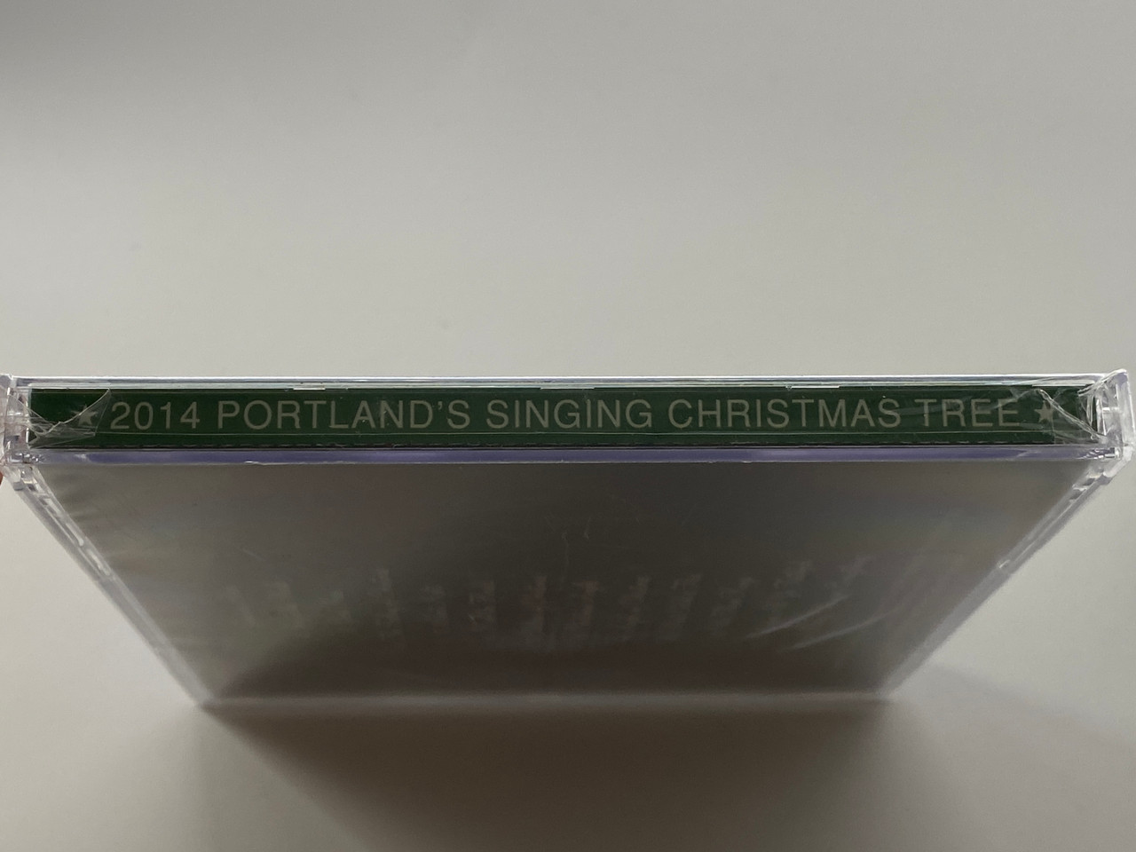 https://cdn11.bigcommerce.com/s-62bdpkt7pb/products/0/images/355925/Portlands_Singing_Christmas_Tree_-_Celebrating_52_years_in_Portland_Directed_by_Wes_Walterman_December_2014_Audio_CD_2014_3__43626.1729527398.1280.1280.jpg?c=2