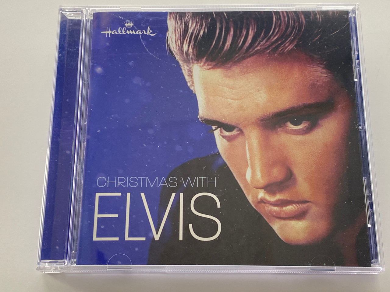 https://cdn11.bigcommerce.com/s-62bdpkt7pb/products/0/images/355929/Christmas_With_Elvis_Hallmark_Audio_CD_2007_38371_1__25538.1729530476.1280.1280.jpg?c=2