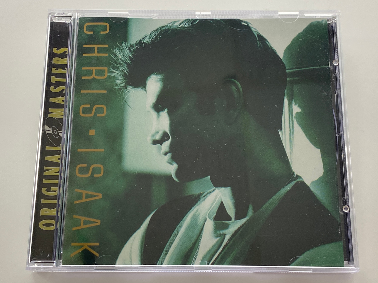 https://cdn11.bigcommerce.com/s-62bdpkt7pb/products/0/images/356538/Chris_Isaak_Original_Masters_Warner_Bros._Records_Audio_CD_1998_7599-25536-2_1__29331.1729759779.1280.1280.jpg?c=2