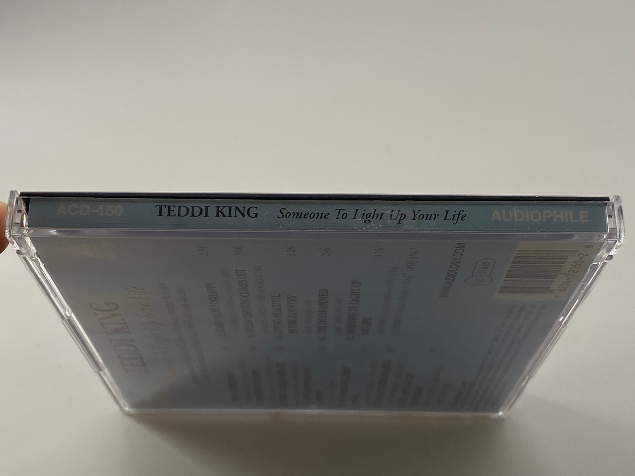https://cdn11.bigcommerce.com/s-62bdpkt7pb/products/0/images/357037/Teddi_King_Someone_To_Light_Up_Your_Life_Audiophile_Audio_CD_2004_ACD-150_3__41823.1729858726.1280.1280.jpg?c=2