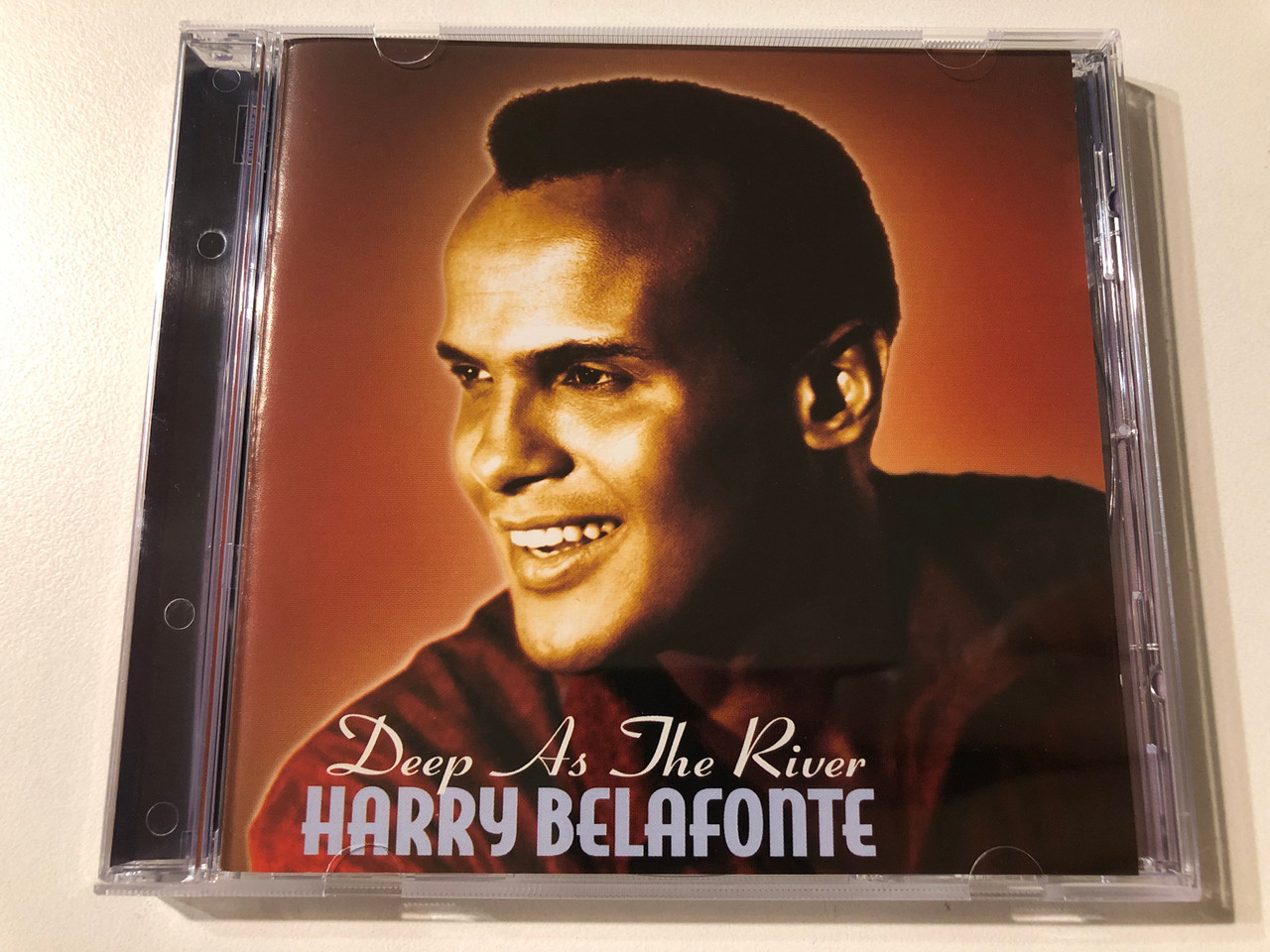 https://cdn11.bigcommerce.com/s-62bdpkt7pb/products/0/images/357351/Harry_Belafonte_Deep_As_The_River_Hallmark_Music_Entertainment_Audio_CD_2006_705882_1__91893.1730358207.1280.1280.JPG?c=2