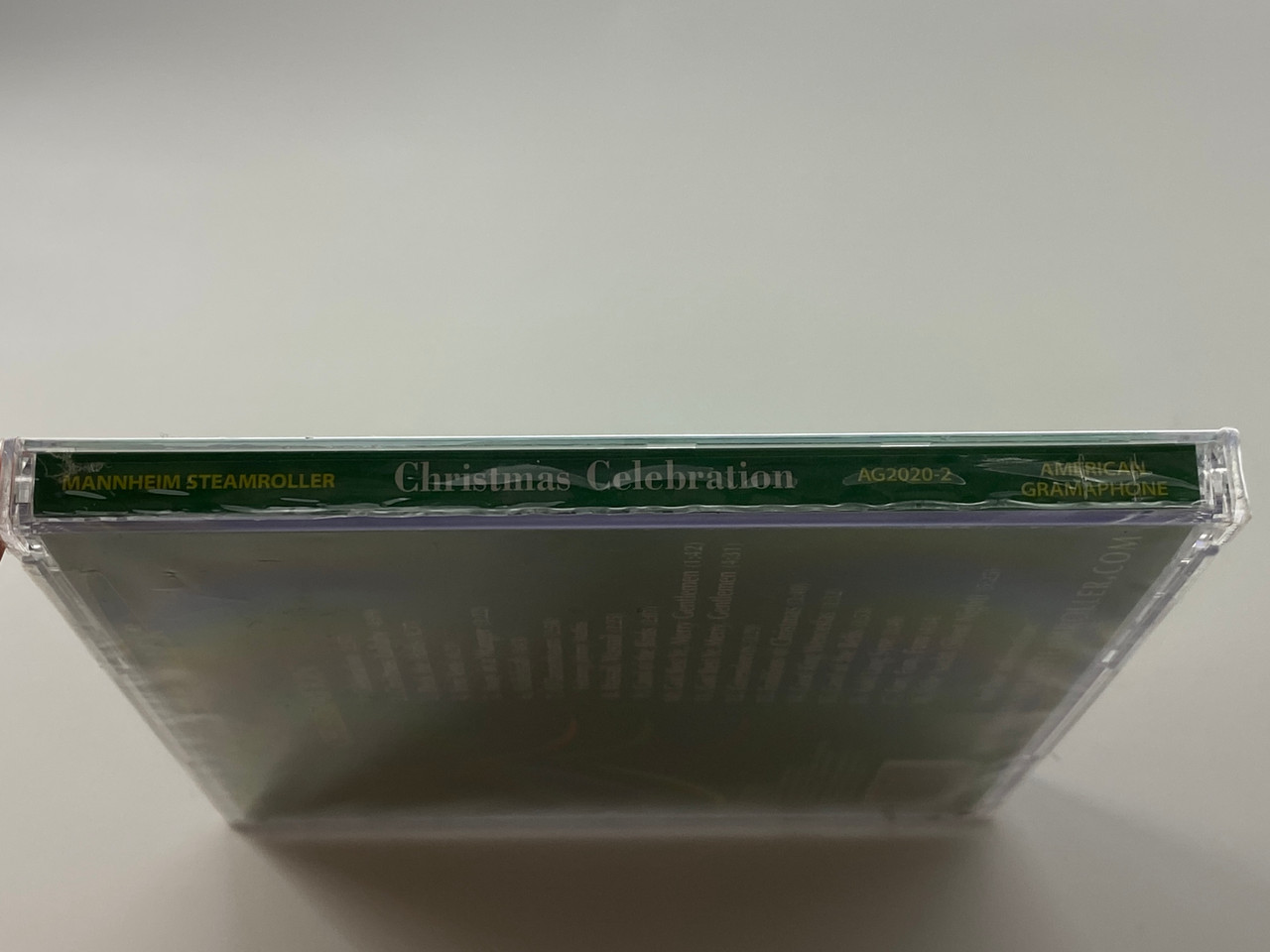 https://cdn11.bigcommerce.com/s-62bdpkt7pb/products/70539/images/354383/Mannheim_Steamroller_Christmas_Celebration_American_Gramaphone_Records_Audio_CD_2004_AG-2020-2_3__70948.1729073915.1280.1280.jpg?c=2