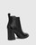 Holanda Black Leather Flared Heel Ankle Boot. 
