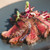 Cooked British Wagyu Minute Sirloin Steak plated