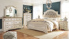 Realyn Two-tone 6 Pc. Dresser, Mirror, Chest & Queen UPH Panel Bed